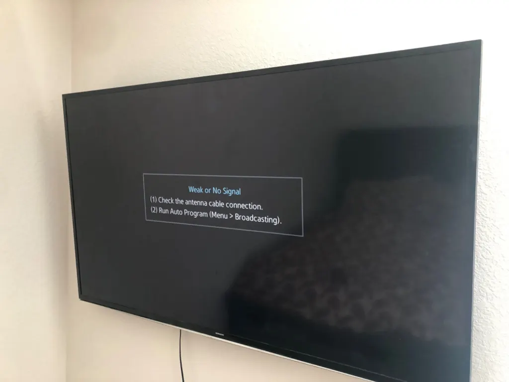 TV mounted on a wall in a living room