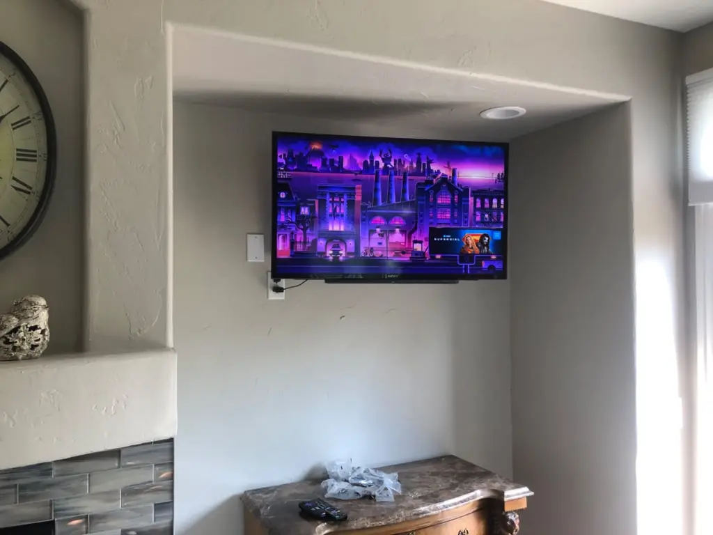 TV mounted in a recessed wall niche in Loveland
